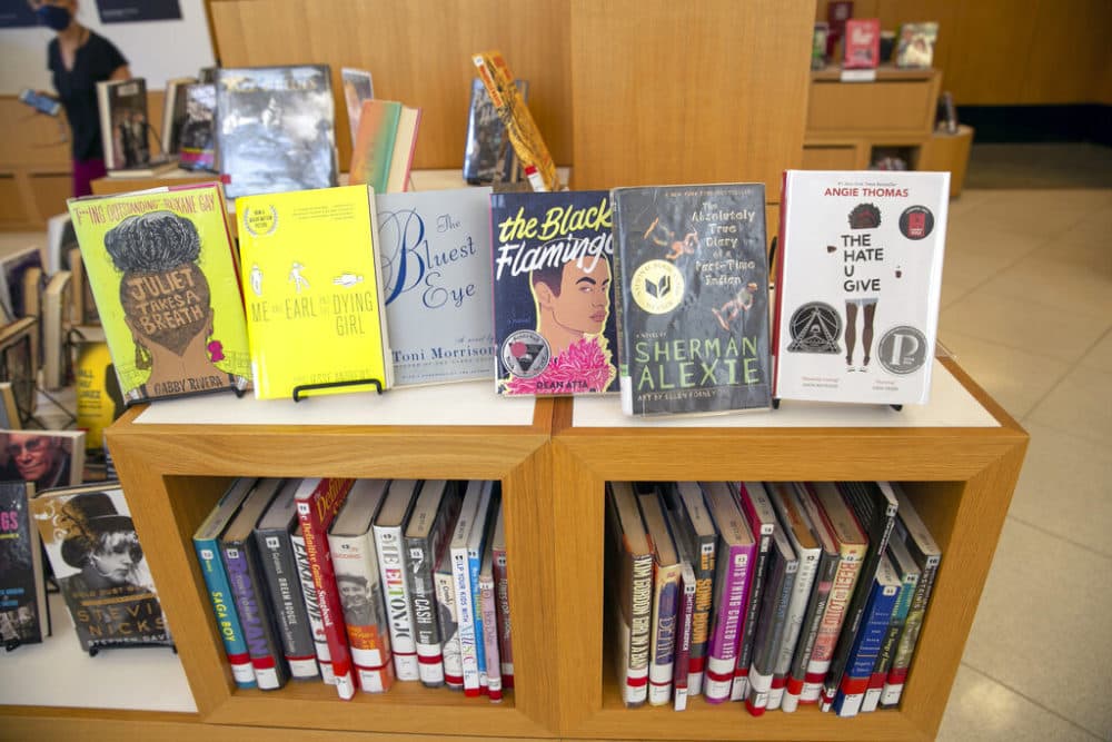 Banned books are visible at the Central Library, a branch of the Brooklyn Public Library system, in New York City on Thursday, July 7, 2022. The books are banned in several public schools and libraries in the U.S., but young people can read digital versions from anywhere through the library. The Brooklyn Public Library offers free membership to anyone in the U.S. aged 13 to 21 who wants to check out and read books digitally in response to the nationwide wave of book censorship and restrictions. (AP Photo/Ted Shaffrey)