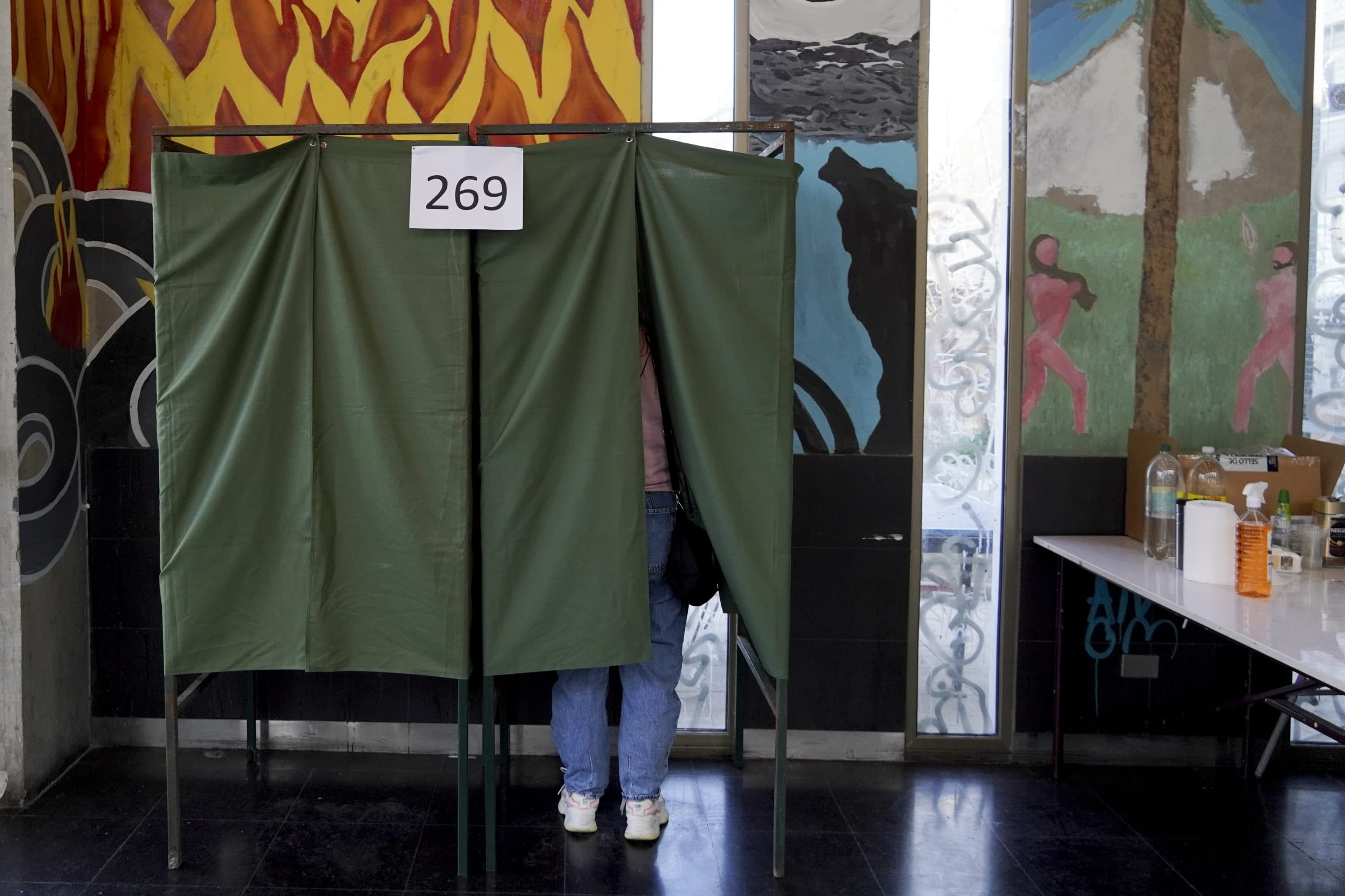 A man votes in a plebiscite on a new draft of the Constitution in Santiago, Chile. (Matias Basualdo/AP)