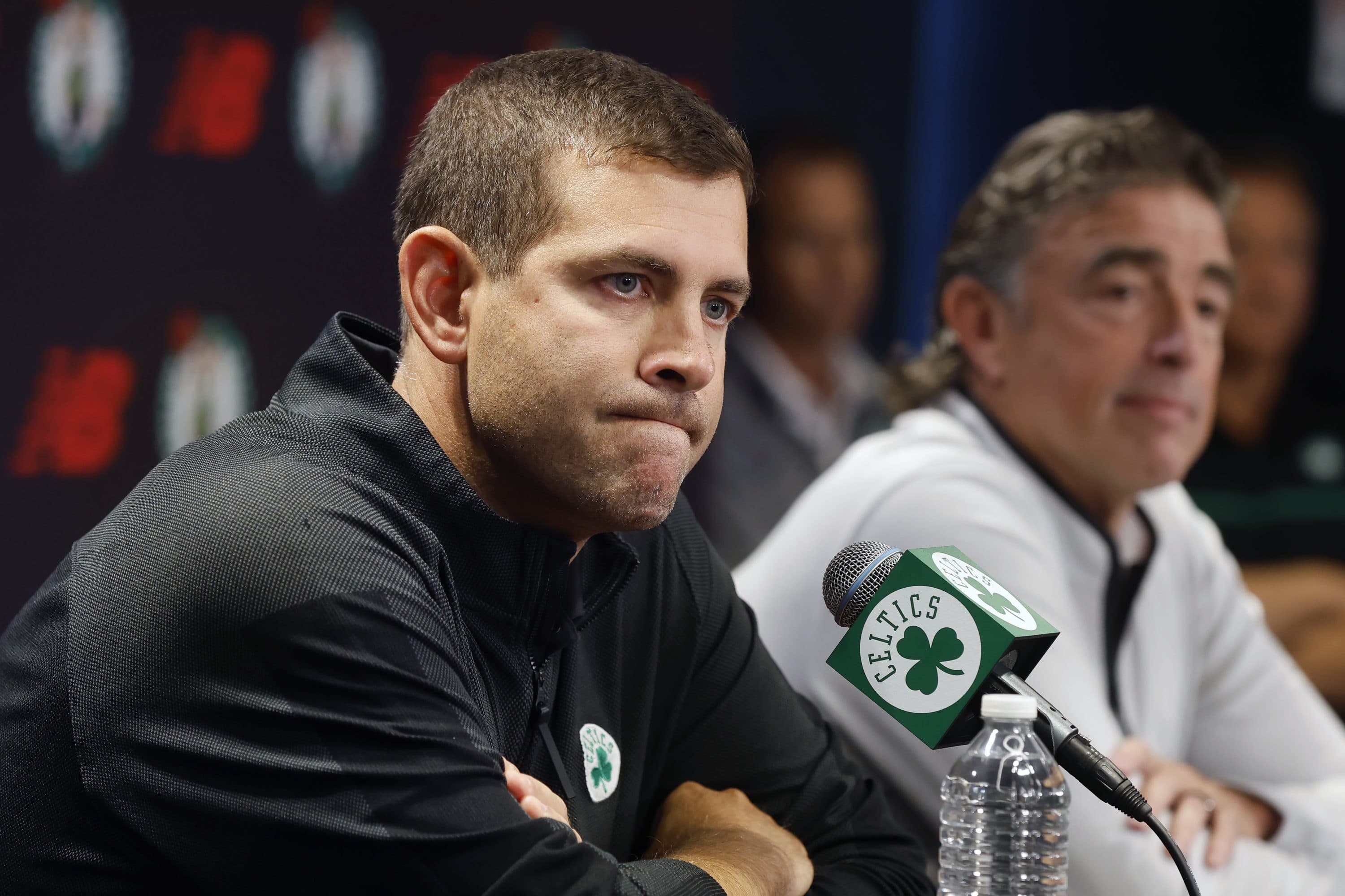 Boston Celtics president of basketball operations Brad Stevens speaks beside owner Wyc Grousbeck, right, during a news conference, Friday, Sept. 23, 2022, in Boston. (Michael Dwyer/AP)