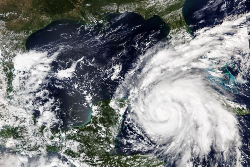 Hurricane Ian was forecast to hit the western tip of Cuba as a major hurricane and then become an even stronger Category 4 with top winds of 140 mph (225 km/h) over warm Gulf of Mexico waters before striking Florida. (NASA Worldview/Earth Observing System Data and Information System (EOSDIS) via AP)