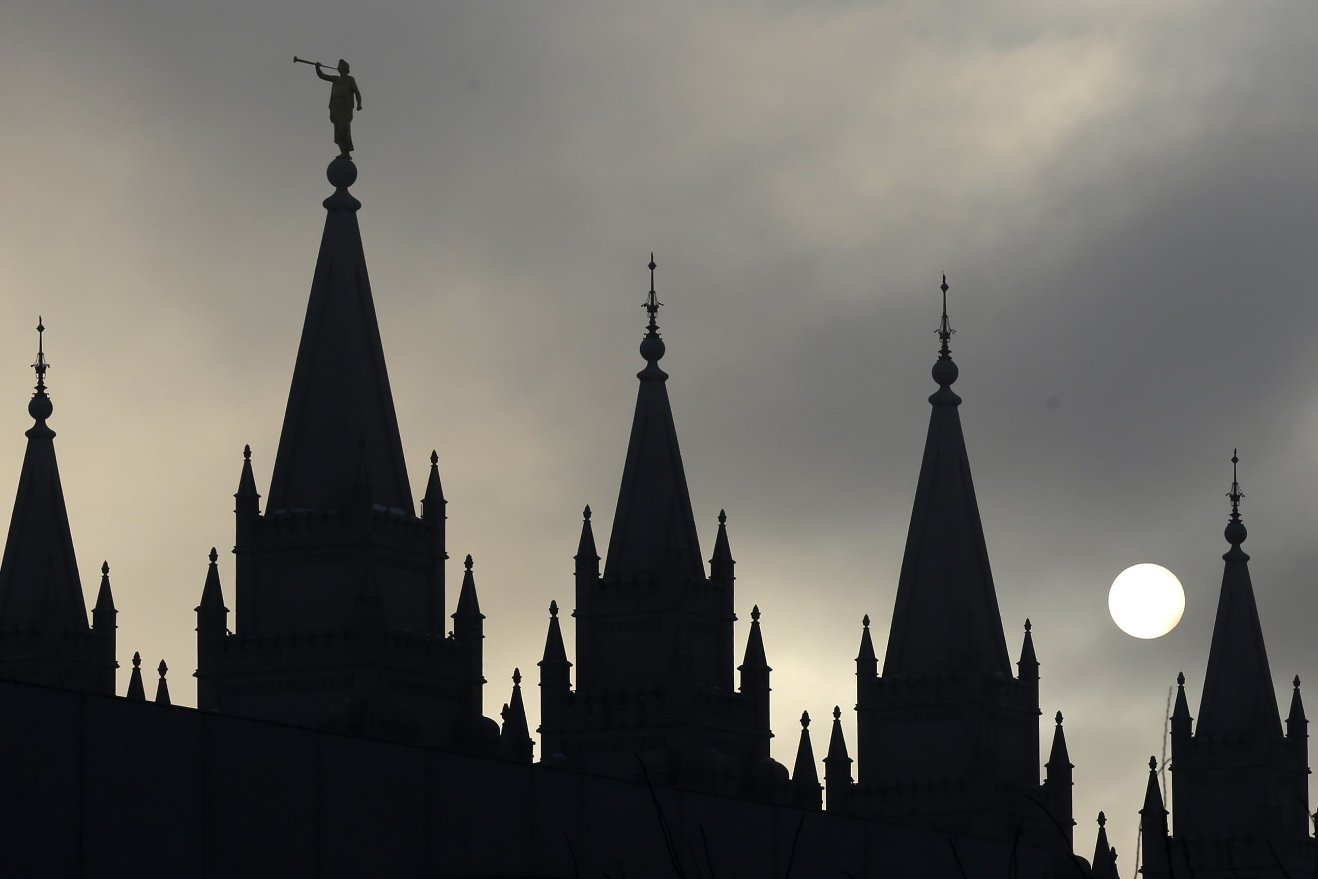 The angel Moroni statue atop the Salt Lake Temple at Temple Square in Salt Lake City. (Bowmer/AP)