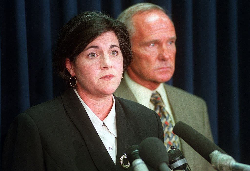 Then-acting Gov. Jane Swift expresses her shock and concern for the Americans killed in the terrorist attack at the world trade center on September 11, 2001 in Framingham, Mass. Attorney General Tom Reilly is in the background. (Janet Knott/The Boston Globe via Getty Images)