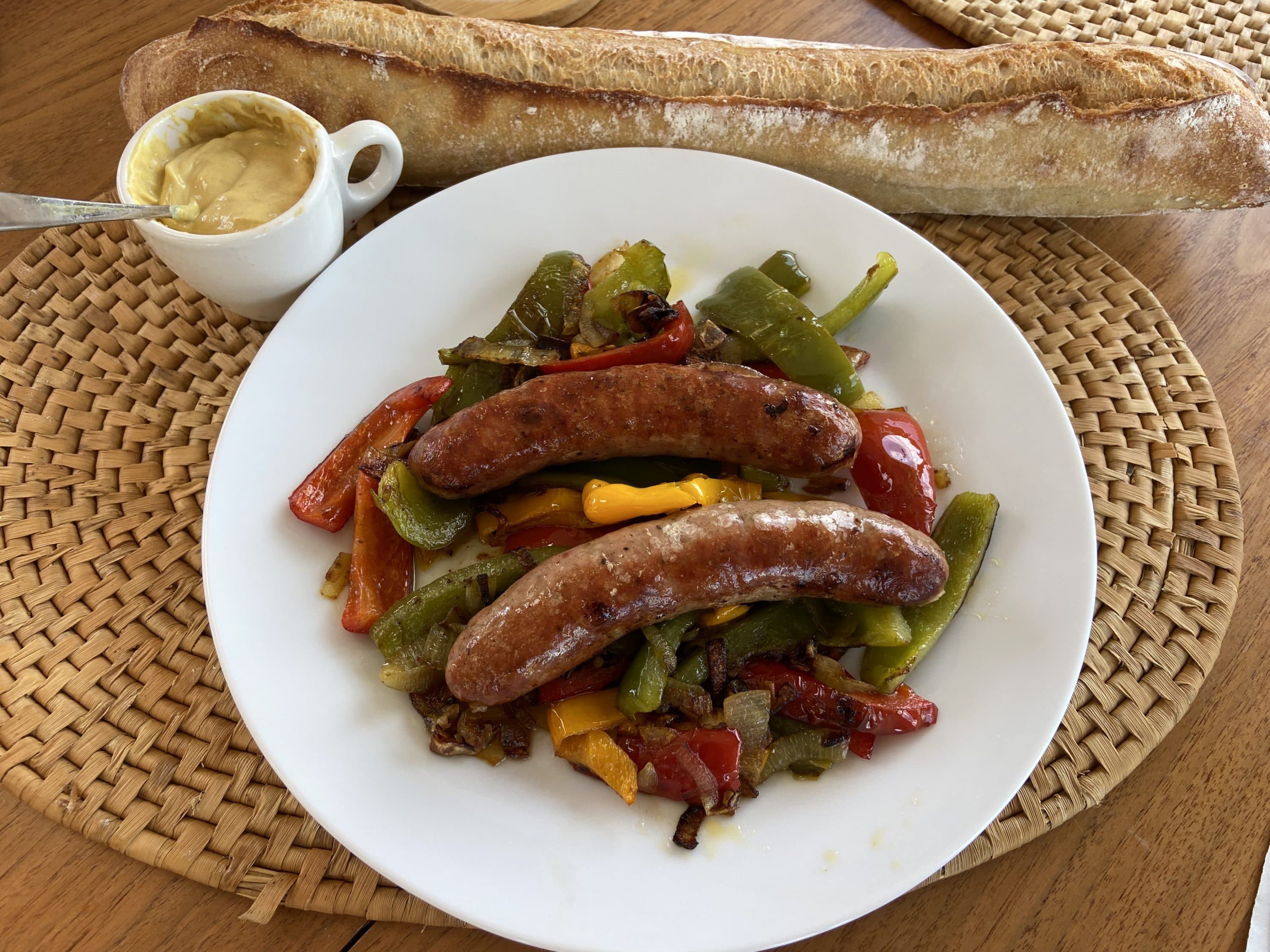 Sausage with peppers and onions. (Kathy Gunst/Here &amp; Now) 