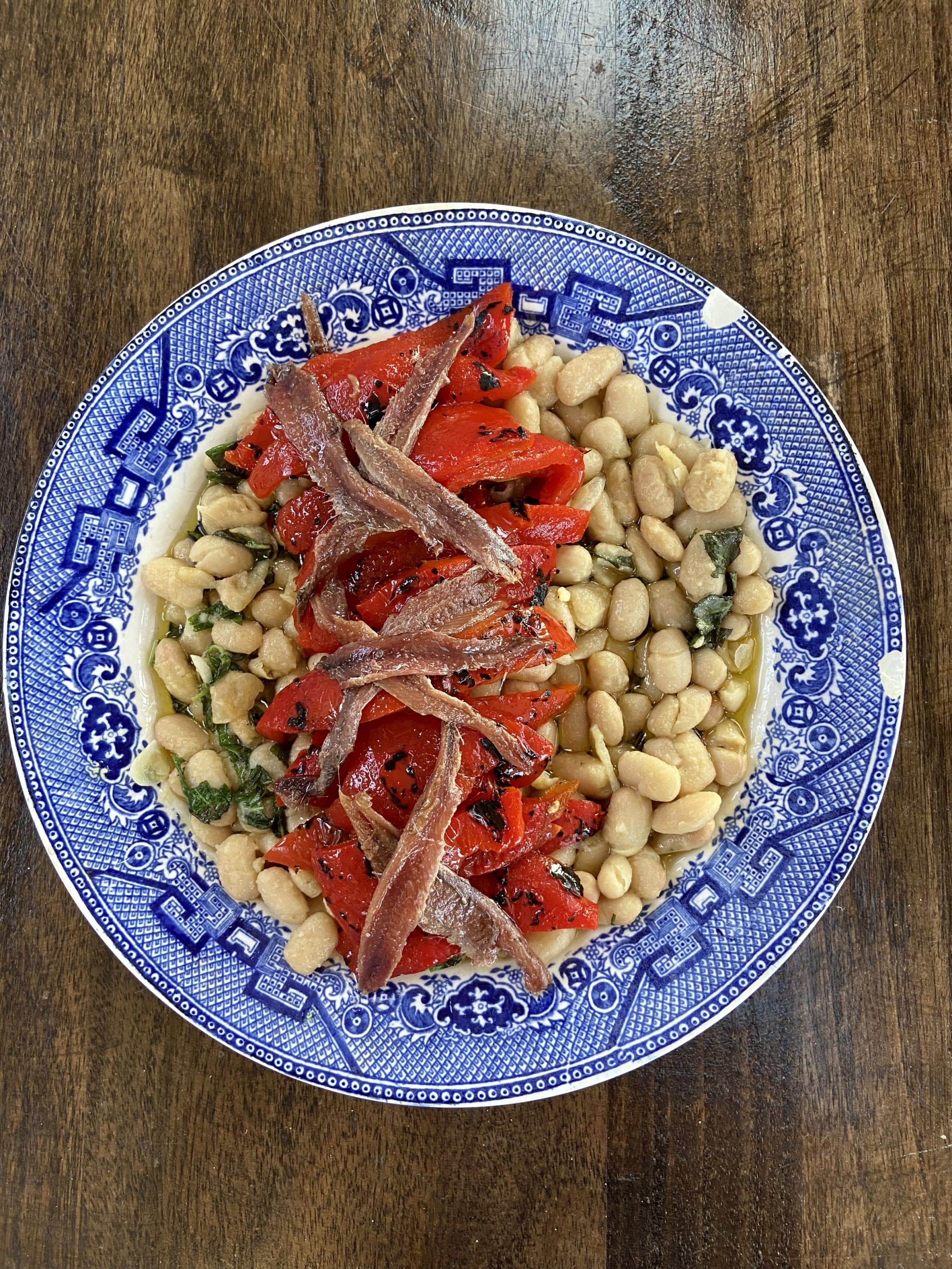White beans with roasted peppers and anchovies. (Kathy Gunst/Here &amp; Now) 