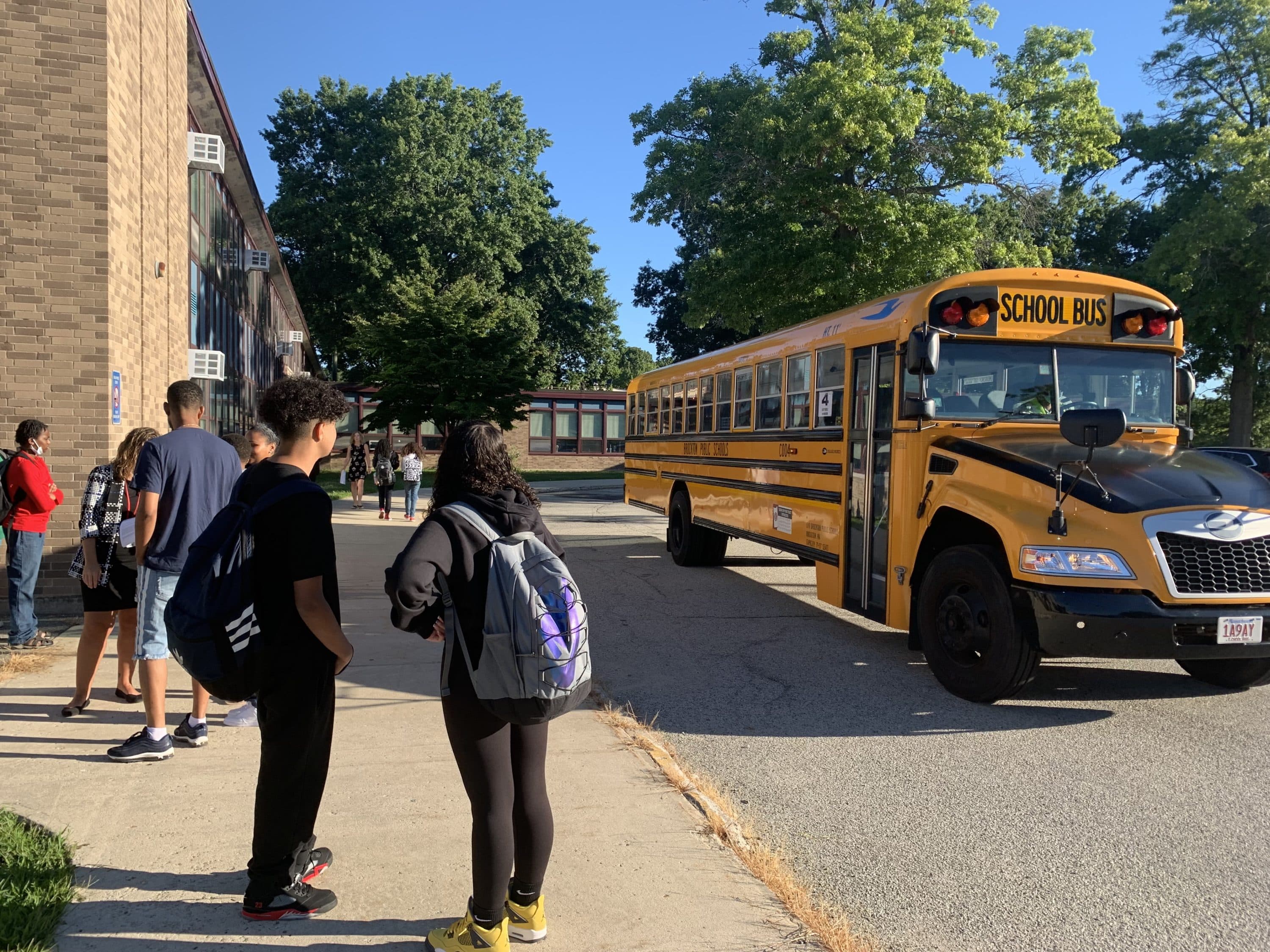 A school bus drops kids off at East Middle School in Brockton on the first day of class. (Carrie Jung/WBUR)