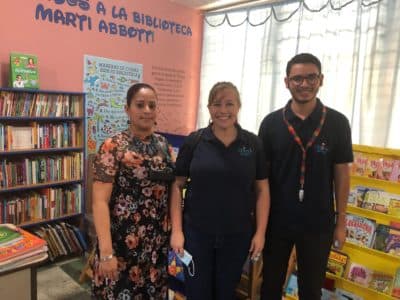 Librarian Jackelin Galindo with Chispa founder Sarah Brakhane and Chispa Educational Program Adminstrator Gleen Miralda (Karyn Miller-Medzon)