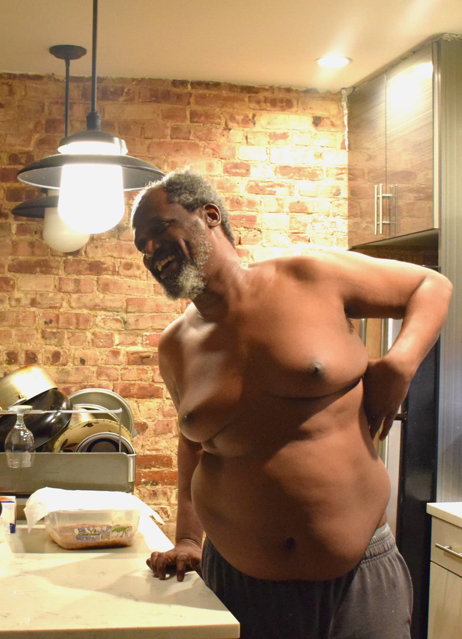 Tino in the kitchen. He's currently staying with his friend Alex, who he lovingly calls his nephew, in Bushwick, NY.