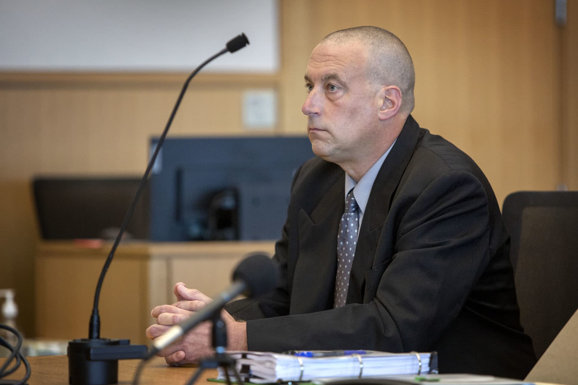 Natick police Officer James Quilty, at a hearing at the Lowell Justice Center in August 2022. (Robin Lubbock/WBUR)