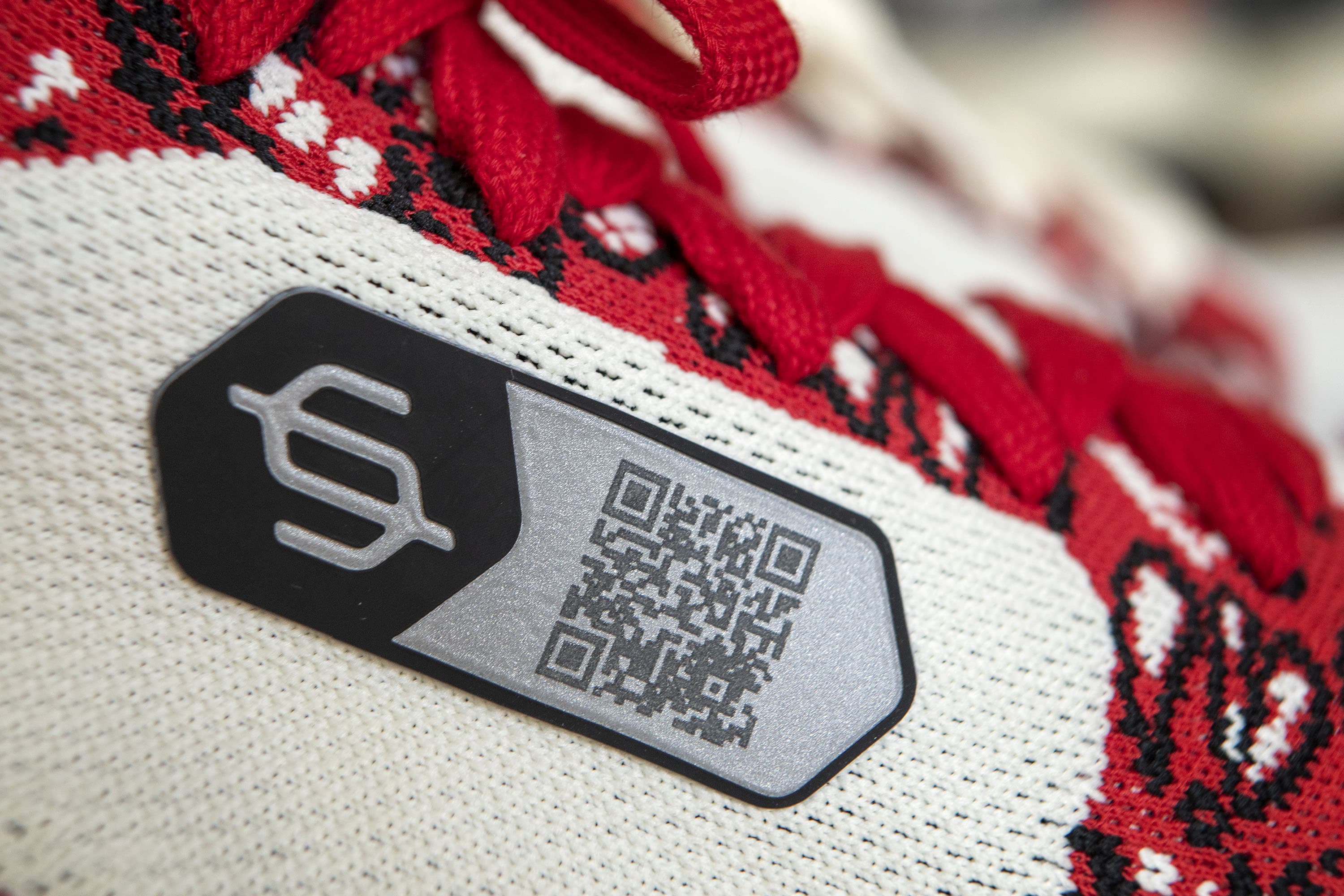 A QR code on a pair of Endstate sneakers will allow you to use augmented reality to place the sneakers anywhere in the environment around you.  Point your phone's camera at it and try it out!  (Robin Lubbock/WBUR)
