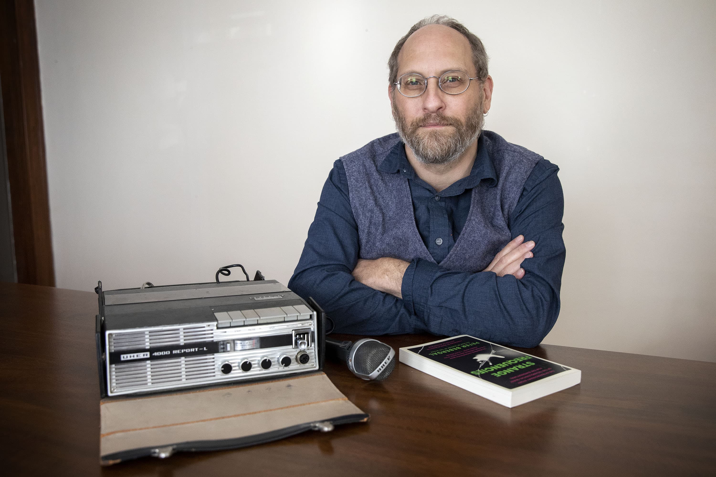 Author Peter Bebergal with his father's reel-to-reel recorder. (Robin Lubbock/WBUR)