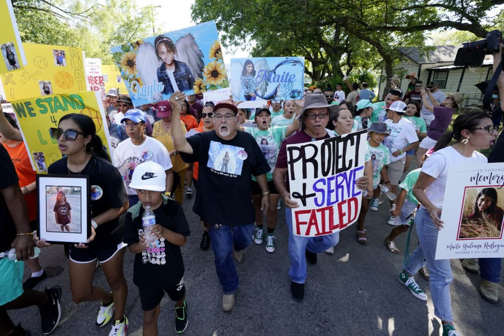Family and friends of those killed and injured in the school shooting at Robb Elementary take part in a protest march and rally. (Eric Gay/AP)
