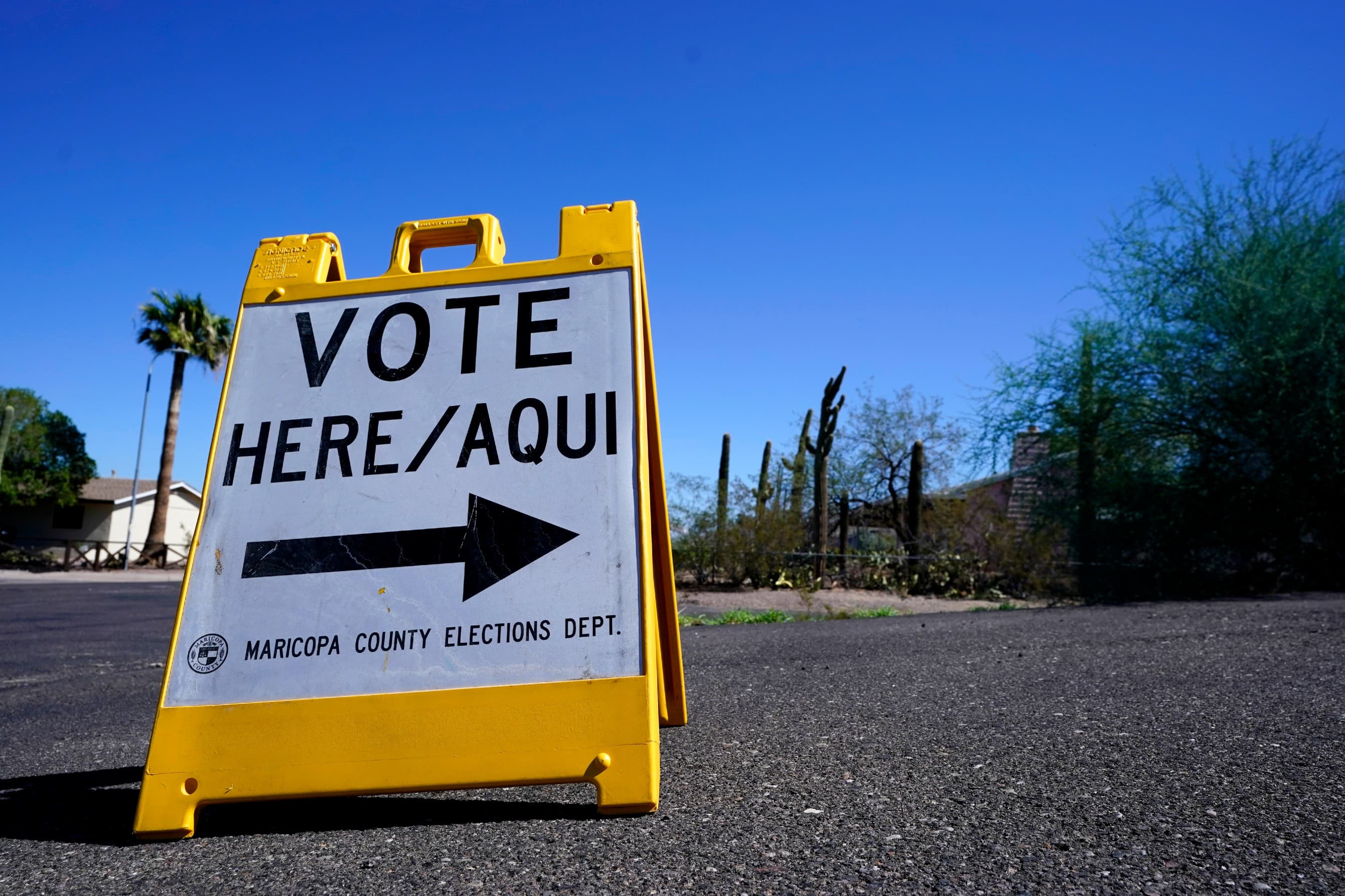 A sign marks the entrance to a voting precinct on the first day of early voting in the general election in Phoenix, Wednesday, Oct. 12, 2022. (Ross D. Franklin/AP)