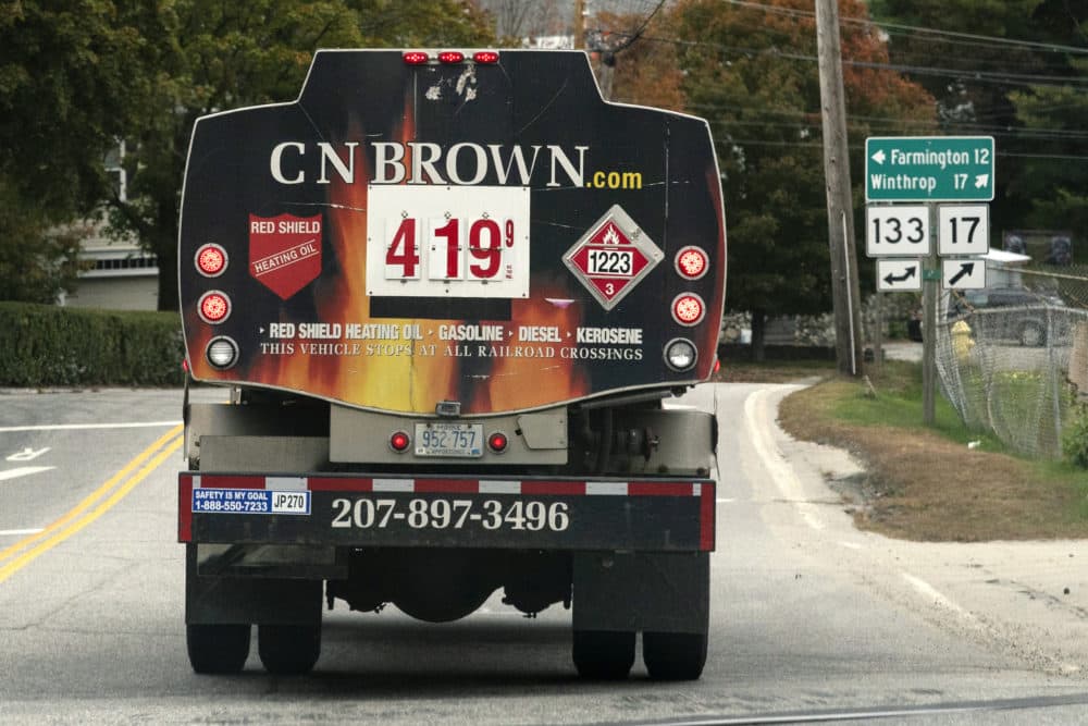 A fuel delivery truck advertises its price for a gallon of heating oil, Oct. 5, 2022 in Livermore Falls, Maine. (Robert F. Bukaty/AP)