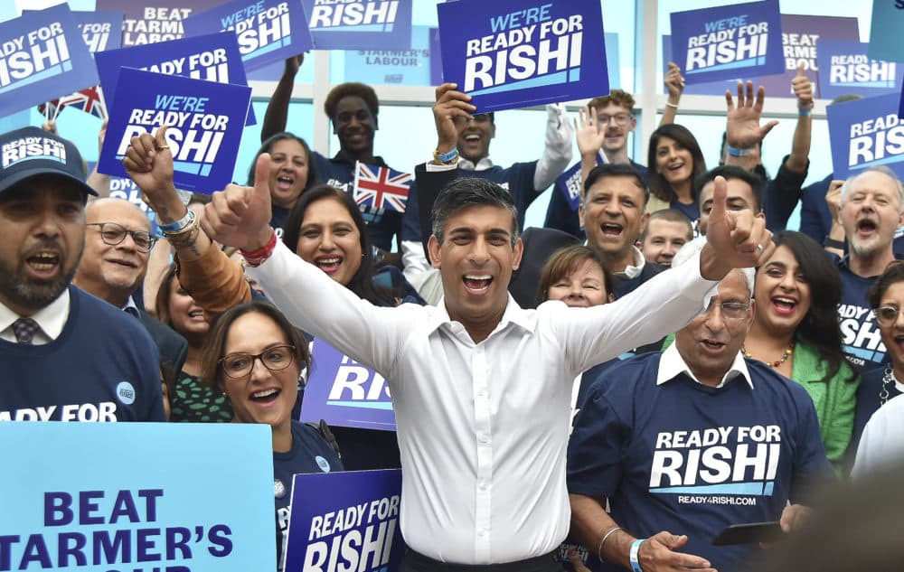 Rishi Sunak meets supporters as he arrives to attend a Conservative Party leadership election . (Rui Vieira/AP)