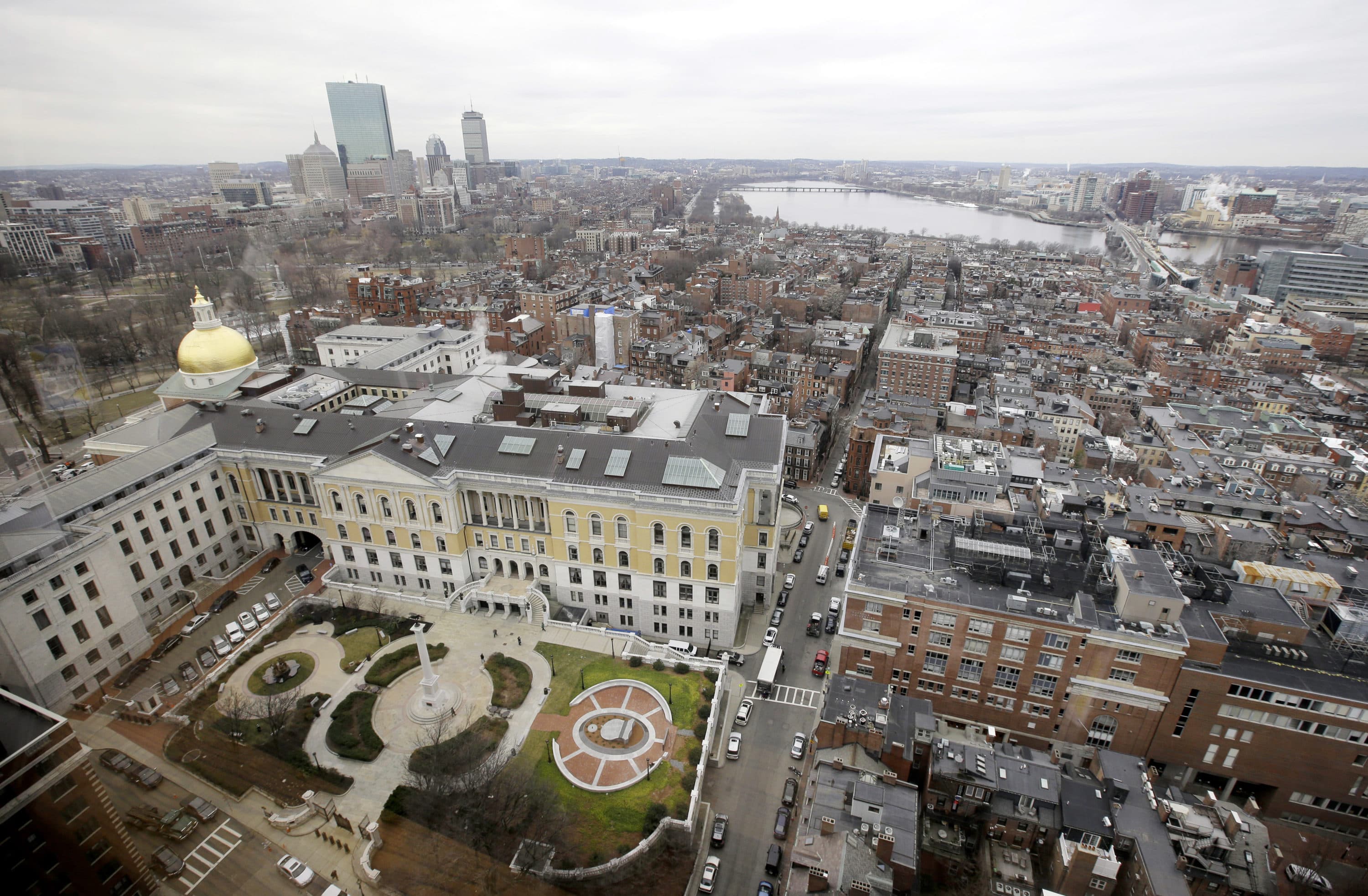 A portion of the Boston Skyline is seen through a window from the office of Massachusetts Attorney General's office. (Steven Senne/AP)