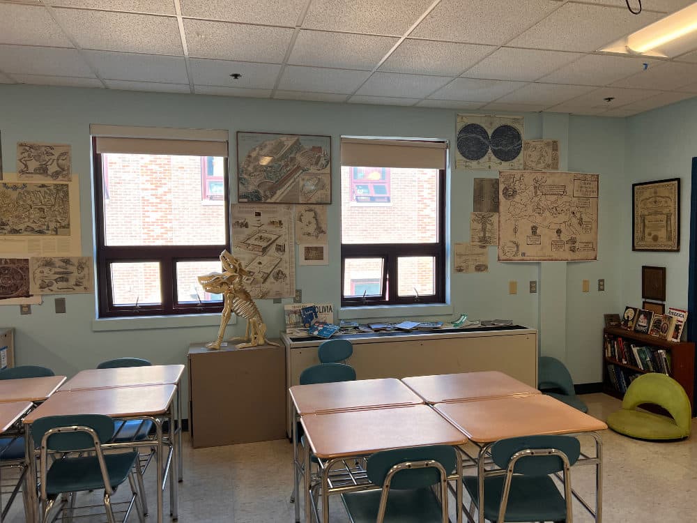 The author's middle school classroom, with desks joined for conversation and visuals covering the walls, Oct. 2022. (Courtesy Abbi Holt)