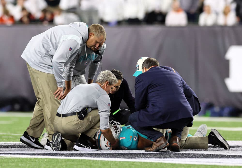 Medical staff tend to quarterback Tua Tagovailoa of the Miami Dolphins after an injury during the 2nd quarter of the game against the Cincinnati Bengals at Paycor Stadium on September 29, 2022 in Cincinnati, Ohio. (Andy Lyons/Getty Images)