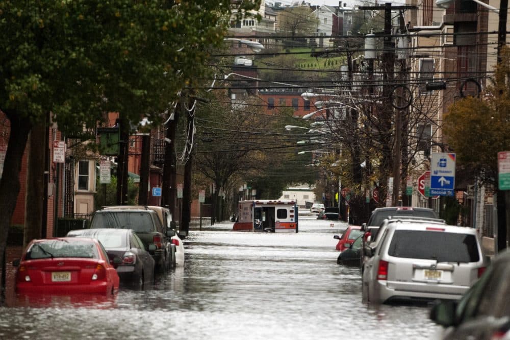 An ambulance sits abandoned in the middle of a flooded street after Hurricane Sandy Oct. 30, 2012 in Hoboken, New Jersey. (Michael Bocchieri/Getty Images)