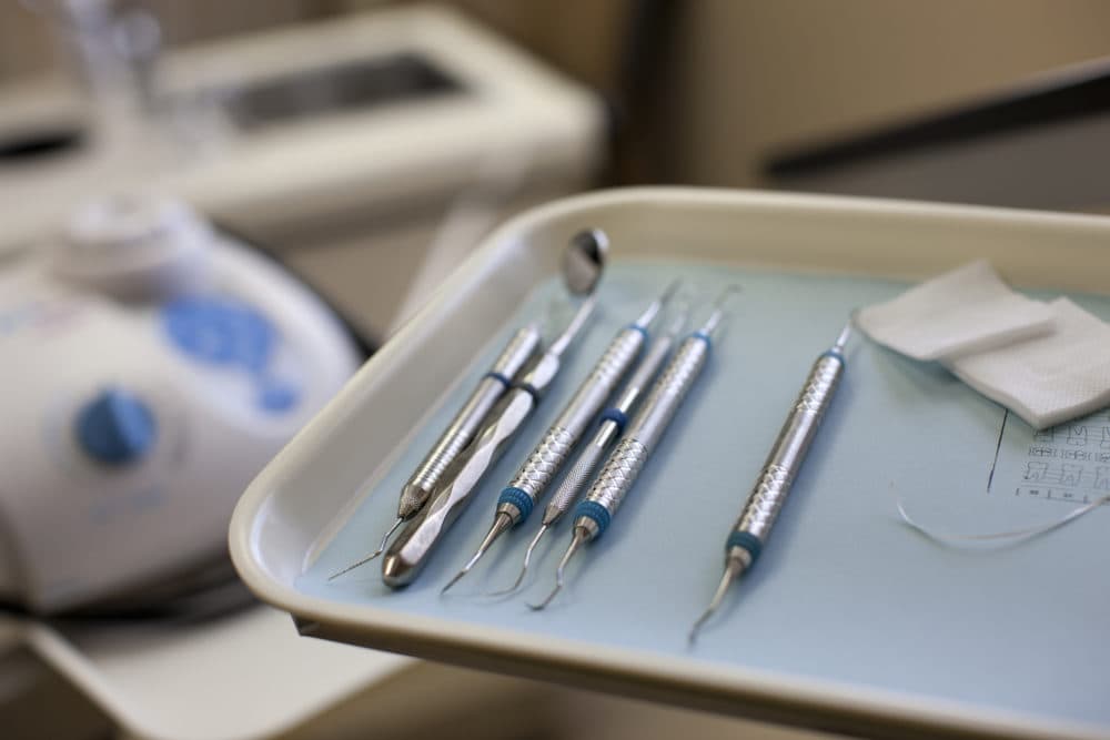 Question 2, one of this year's statewide ballot initiatives, asks voters if Massachusetts should become the only state to set a fixed percentage of premiums dental insurers must spend on patient care. (David Sacks via Getty Images)