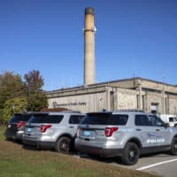 UMass police cars parked outside the Department of Public Safety at UMass Dartmouth. (Robin Lubbock/WBUR)