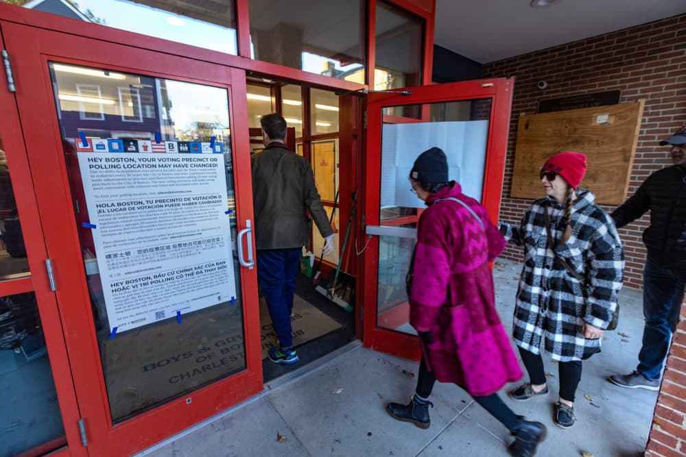 Voters enter the Charlestown Boys and Girls Club in the early morning on Election Day. (Jesse Costa/WBUR)