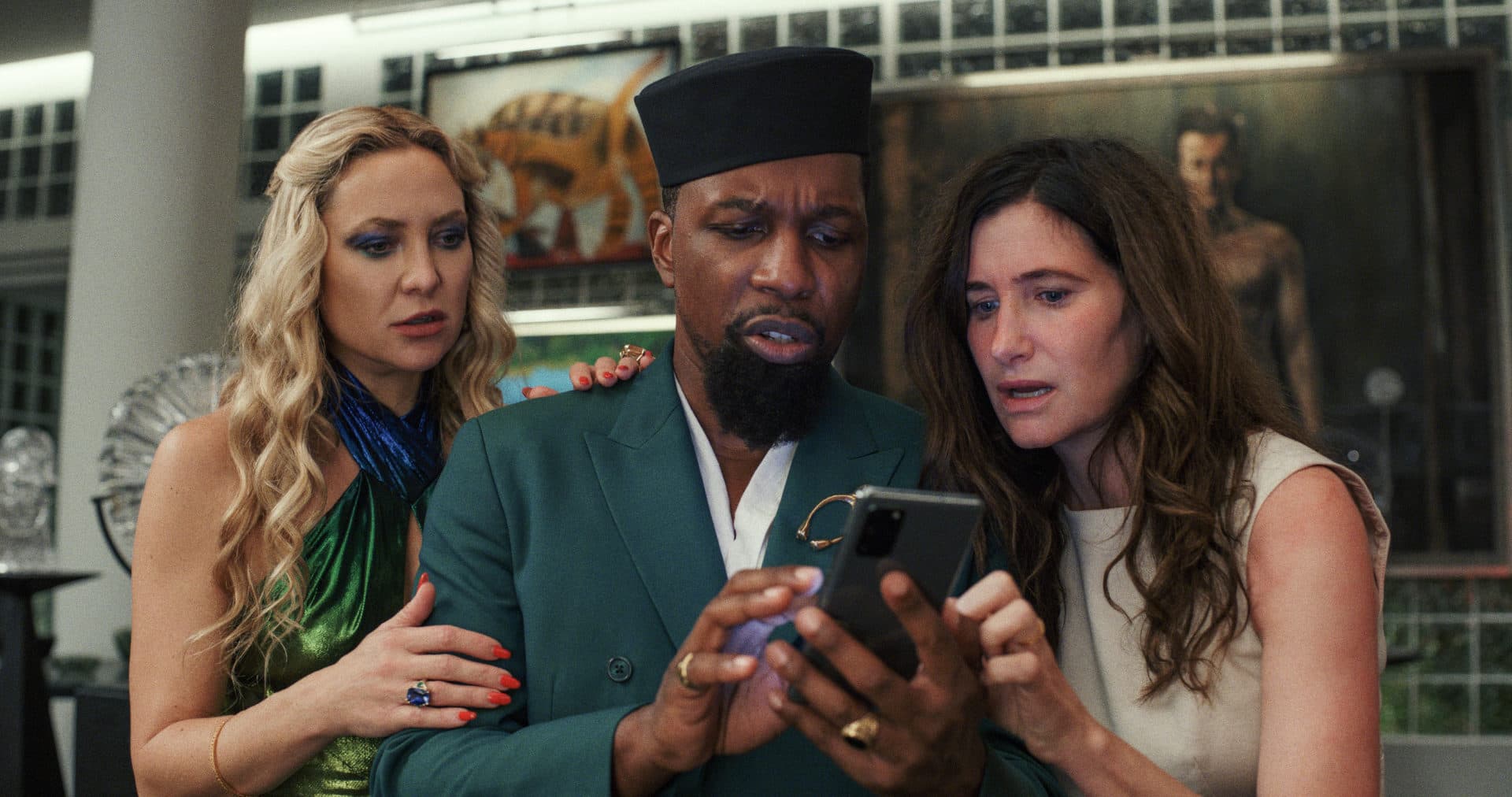 Kate Hudson as Birdie, Leslie Odom Jr. as Lionel and Kathryn Hahn as Claire in &quot;Glass Onion: A Knives Out Mystery.&quot; (Courtesy Netflix) 