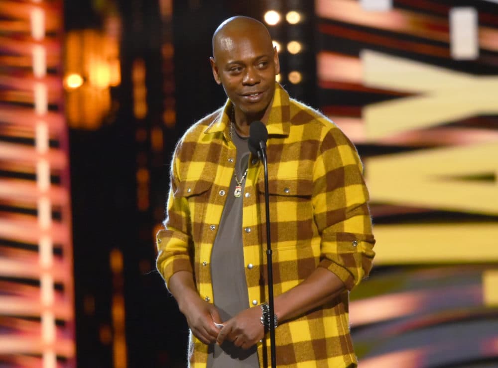 Dave Chappelle appears during the Rock & Roll Hall of Fame induction ceremony. (David Richard/AP)
