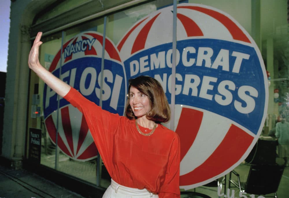 Nancy Pelosi, then a candidate for Congress, waved from her campaign headquarters in San Francisco on April 7, 1987. (Paul Sakuma/AP)