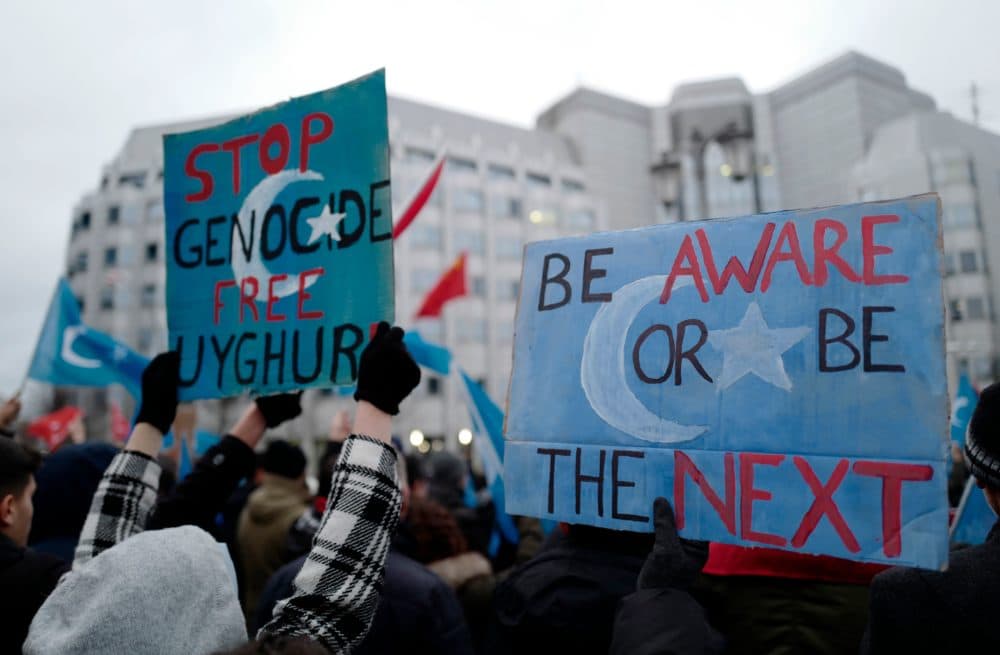 Demonstrators take part in a protest outside the Chinese embassy in Berlin on Dec. 27, 2019, to call attention to Chinas mistreatment of members of the Uyghur community in western China. (John Macdougall MACDOUGALL/AFP via Getty Images)