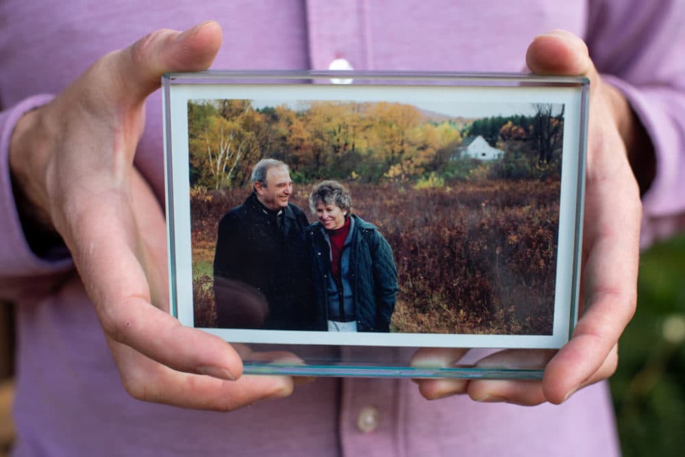 James Vlahos, CEO of HereafterAI, holds a photograph of his parents, John and Martha Vlahos, outside his home on November 11, 2022 in El Cerrito, California. James created a chatbot or Dadbot as he calls it which allowed him to reconnect with his deceased father, the original motivation for starting HereafterAI. (Getty Images)