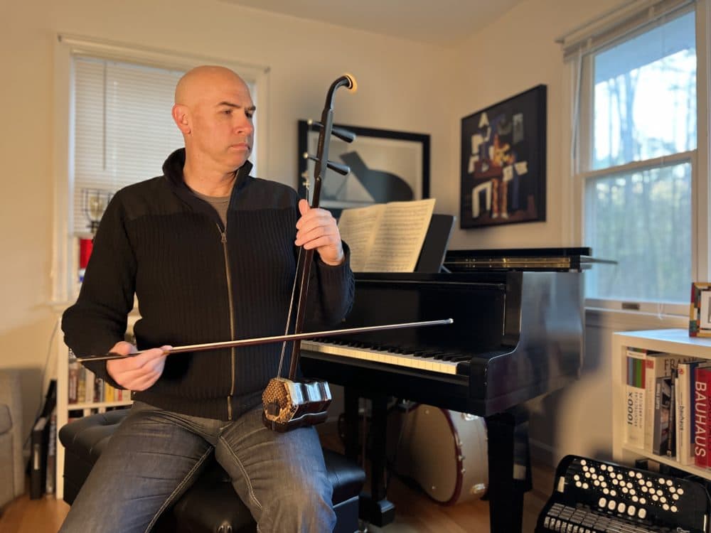 Eric Shimelonis plays the erhu: an Asian instrument that many say sounds similar to the human voice, and can even imitate natural sounds like birds and horses! (Courtesy of Rebecca Sheir)