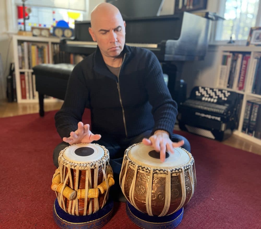 Eric Shimelonis plays the tabla: a pair of drums traditionally used to accompany both vocal and instrumental performance. (Courtesy of Rebecca Sheir)