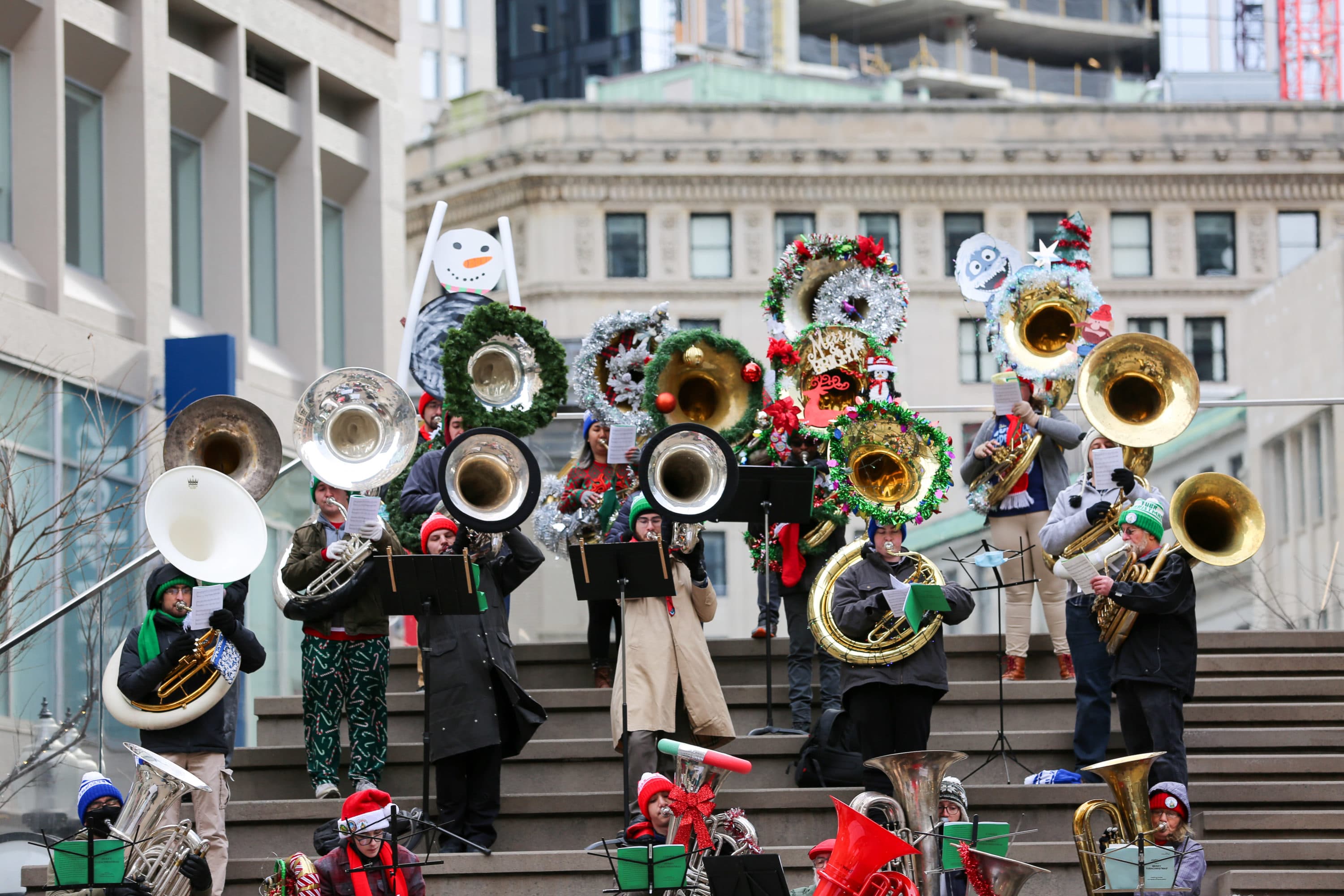 Sousaphone players rehearse for Boston &quot;TubaChristmas&quot; in Downtown Crossing. (Courtesy George Comeau)