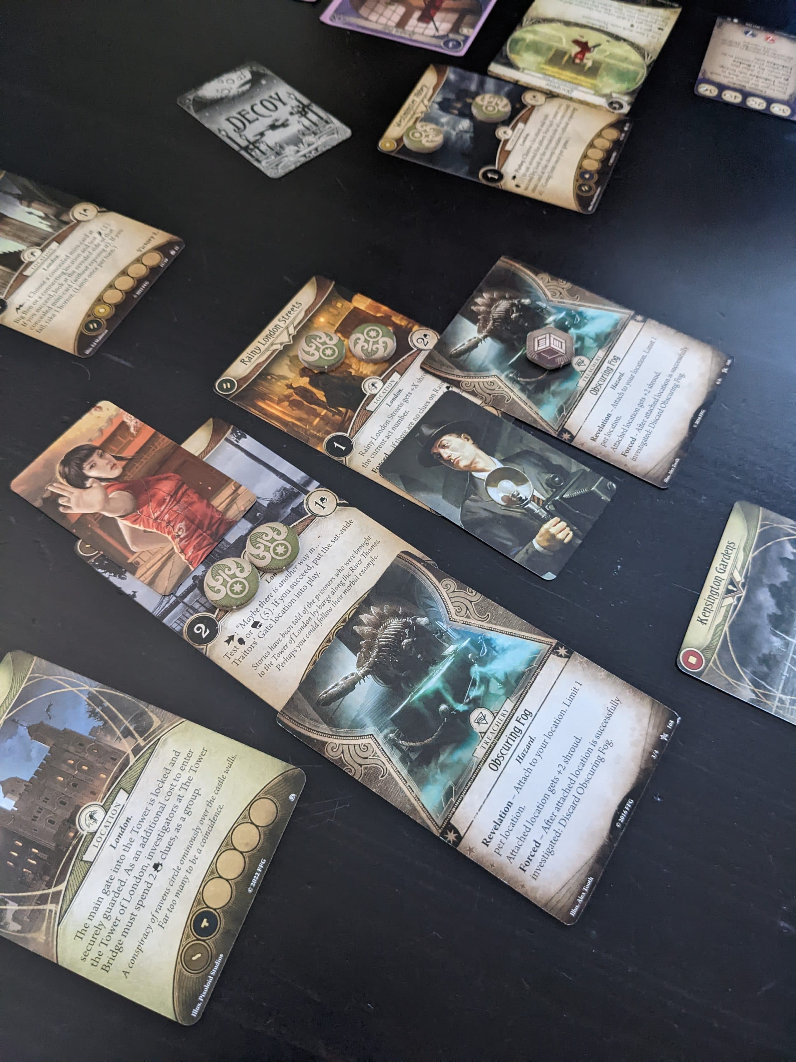 Investigators in "Arkham Horror: The Card Game" cooperate to avert cosmic disaster by traversing far-flung locations. (James Mastromarino/Here & Now)