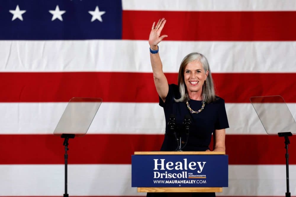 U.S. Rep. Katherine Clark waves on stage during a Democratic election night party on Nov. 8, 2022, in Boston. (Michael Dwyer/AP)