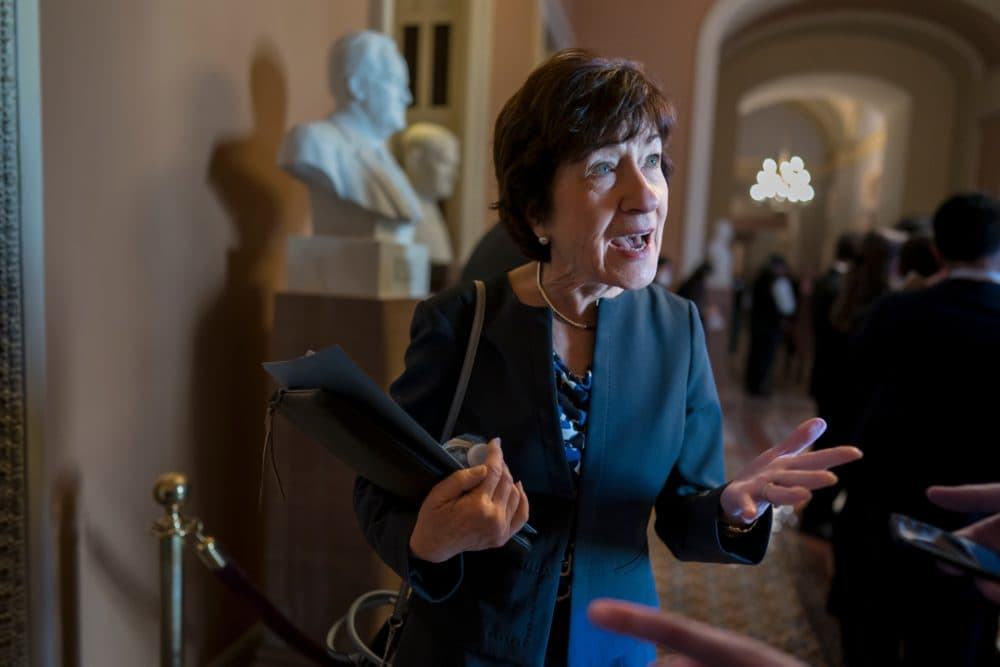 Sen. Susan Collins of Maine remains the only Republican member of Congress from New England. Above, she talks to a reporter this week at the Capitol in Washington. (J. Scott Applewhite/AP)