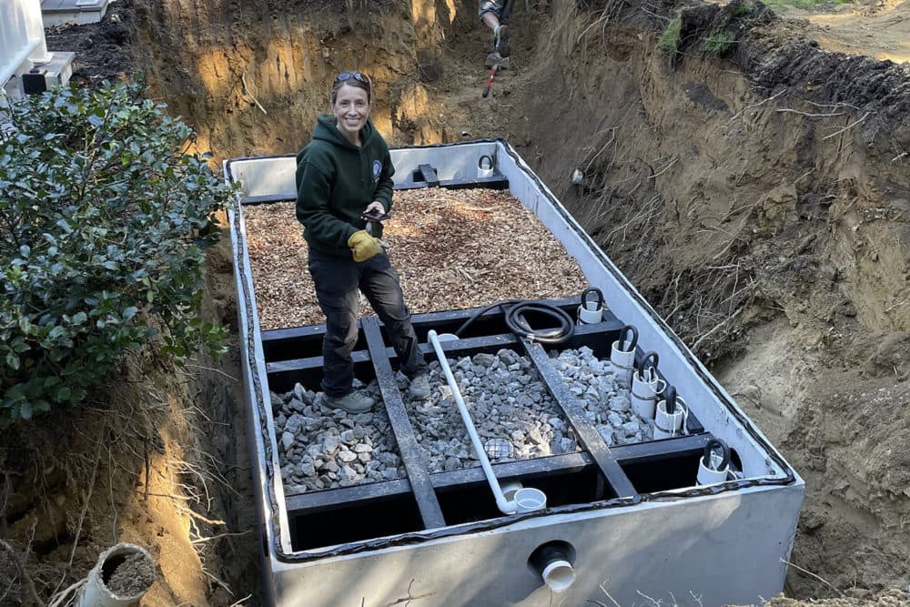 Installing an updated septic system at Shubael Pond in Barnstable, on Cape Cod. (Courtesy Barnstable Clean Water Coalition)