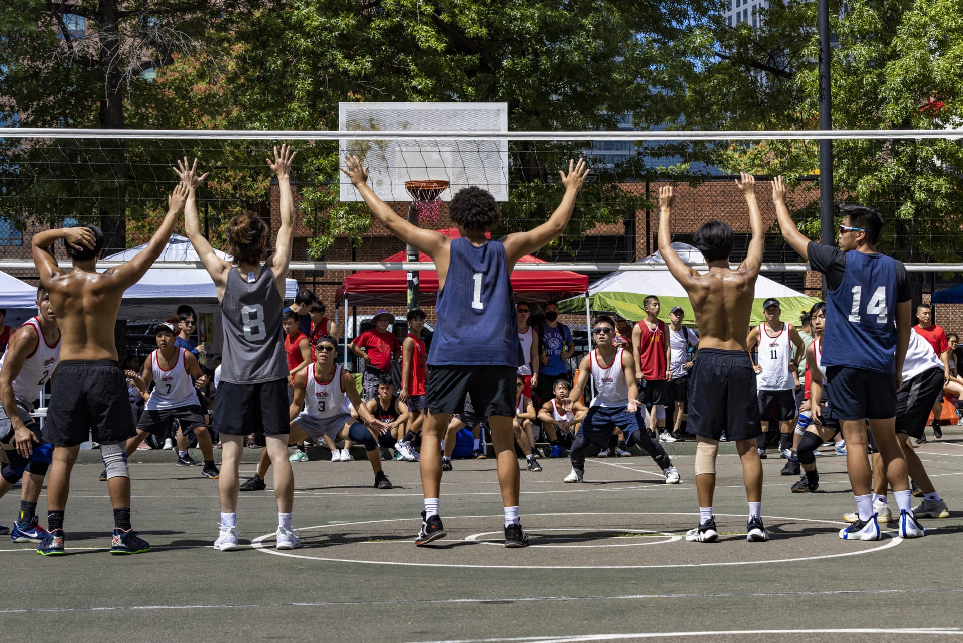 The Boston Freemasons face off against the Rising Tide during the Reggie Wong Memorial Volleyball Tournament at Reggie Wong Park in August 2022. (Jesse Costa/WBUR)