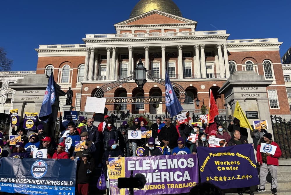 Labor advocates and app-based drivers rally outside the State House to demand the right to collectively bargain for better wages, benefits and working conditions. (Sam Drysdale/SHNS)