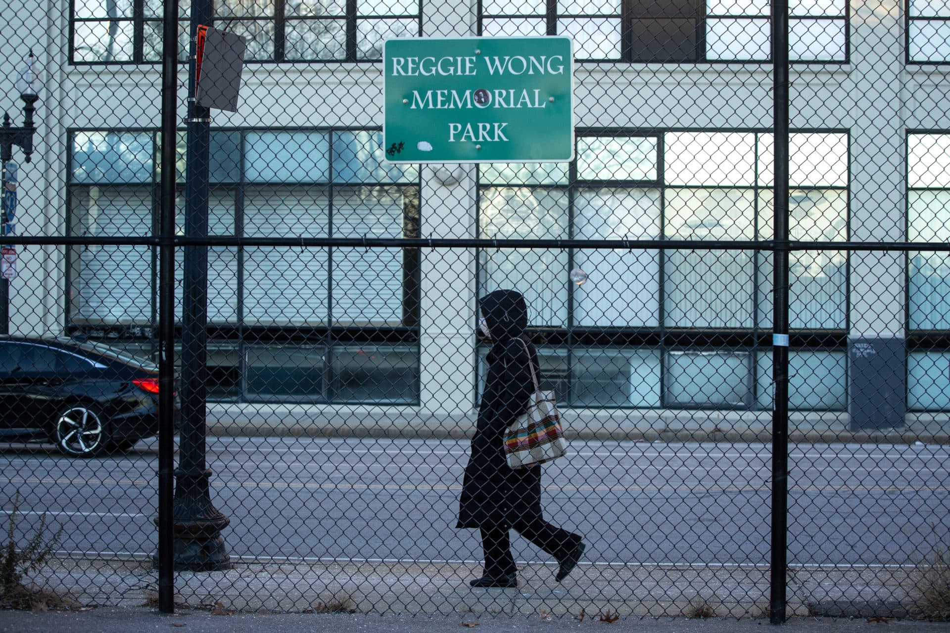 A sign for the Reggie Wong Memorial Park on Kneeland Street, Boston. (Robin Lubbock/WBUR)