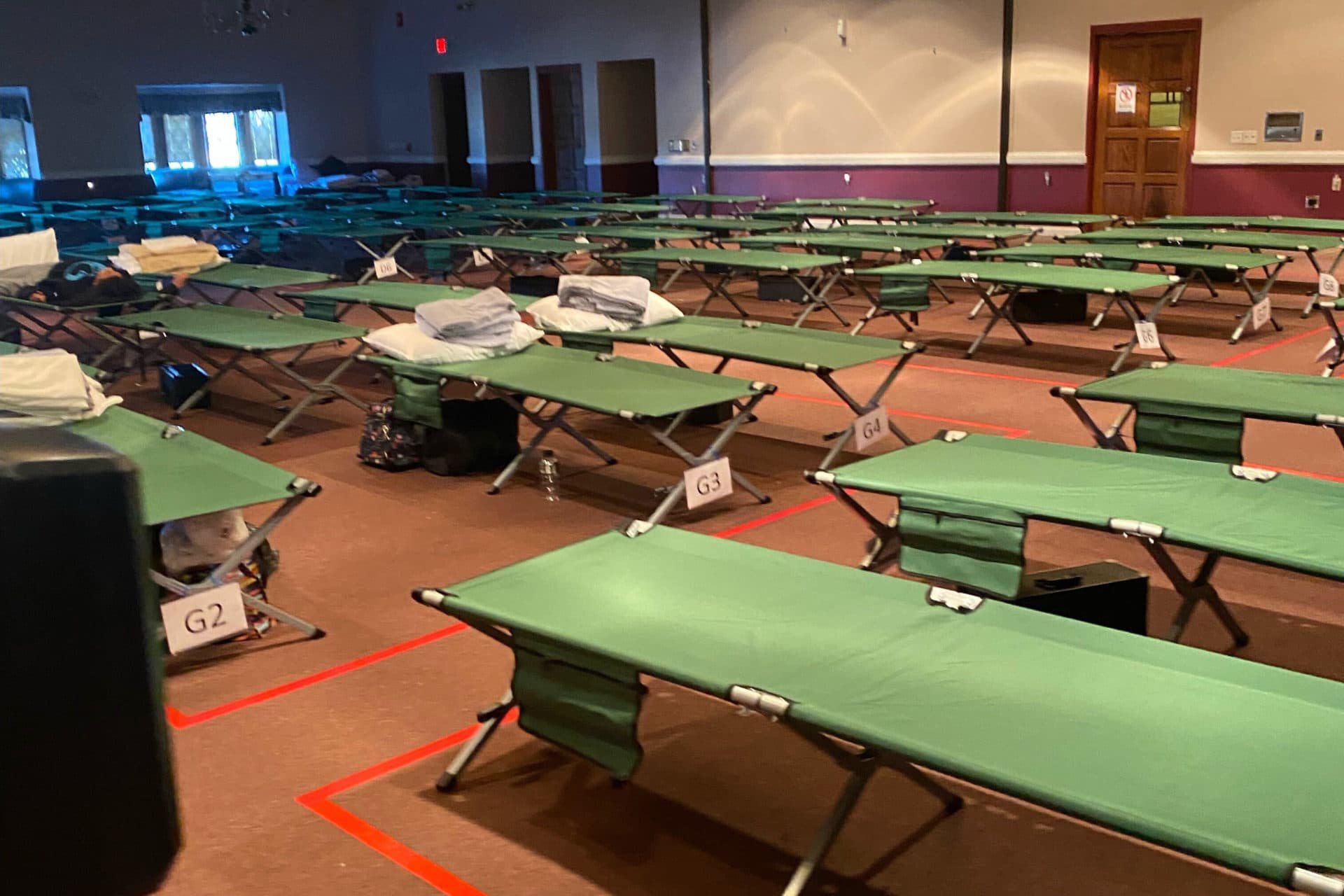 Mass. to close temporary shelter in Devens, relocate families | WBUR News