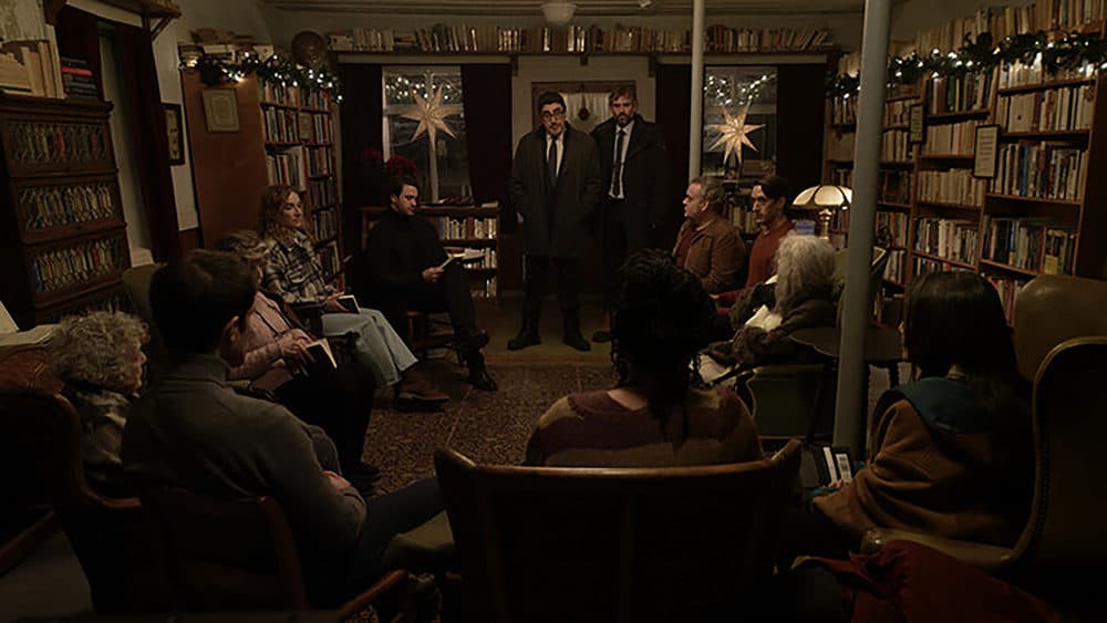 Chief Inspector Armand Gamache (Alred Molina) and Jean-Guy Beauvoir (Rossif Sutherland) interrupt a meeting of the Three Pines book club. (Courtesy Amazon Studios)