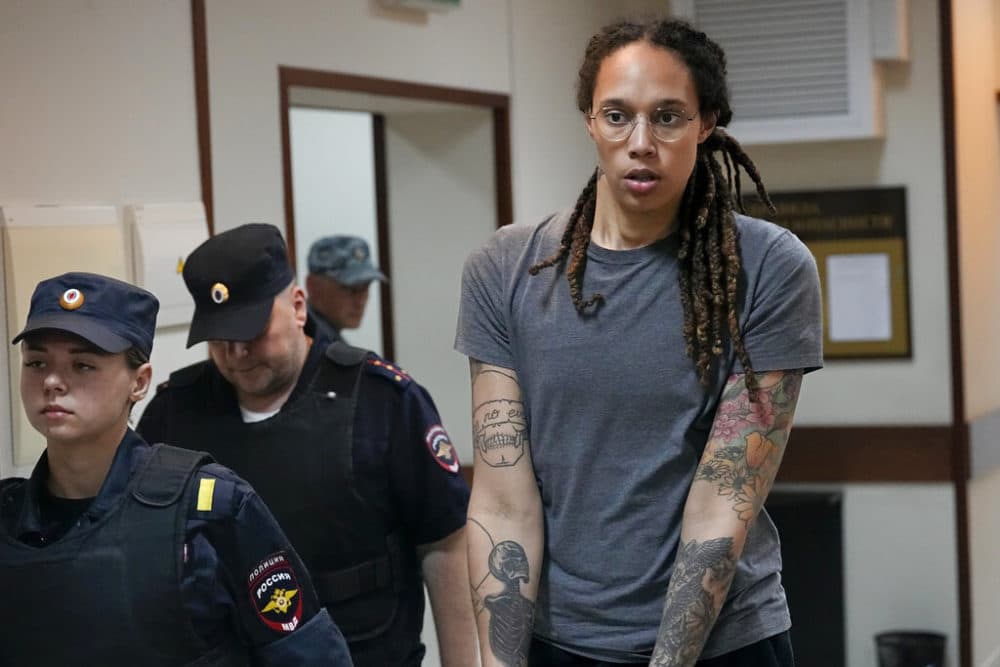 WNBA star and two-time Olympic gold medalist Brittney Griner is escorted from a courtroom. (Alexander Zemlianichenko/AP)