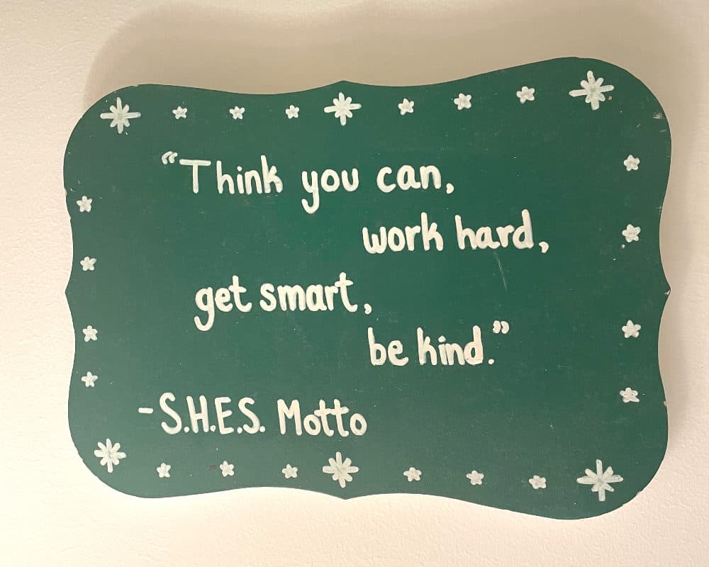 Sandy Hook’s motto is written on a small sign in my bedroom. I see these words each morning and evening, bookends to my day, writes Ayesha Dholakia. (Courtesy Ayesha Dholakia)