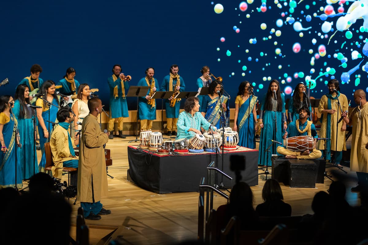 The Berklee Indian Ensemble performing with Zakir Hussain. (Courtesy Mike Spencer)