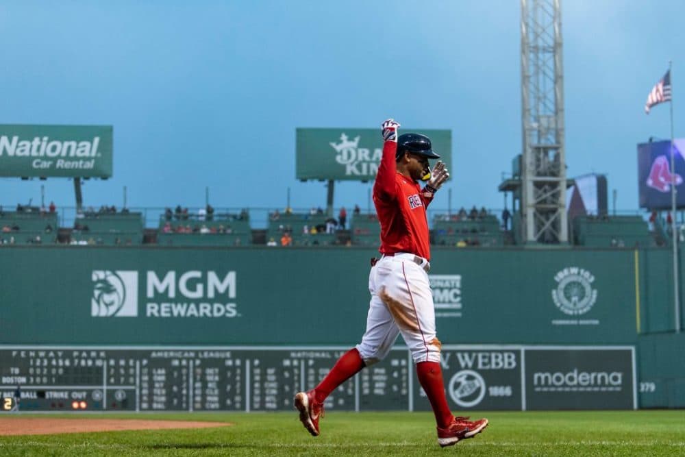 Xander Bogaerts of the Boston Red Sox reacts after hitting a single during the sixth inning of a game against the Tampa Bay Rays on October 5, 2022 at Fenway Park in Boston, Massachusetts. (Billie Weiss/Boston Red Sox/Getty Images)