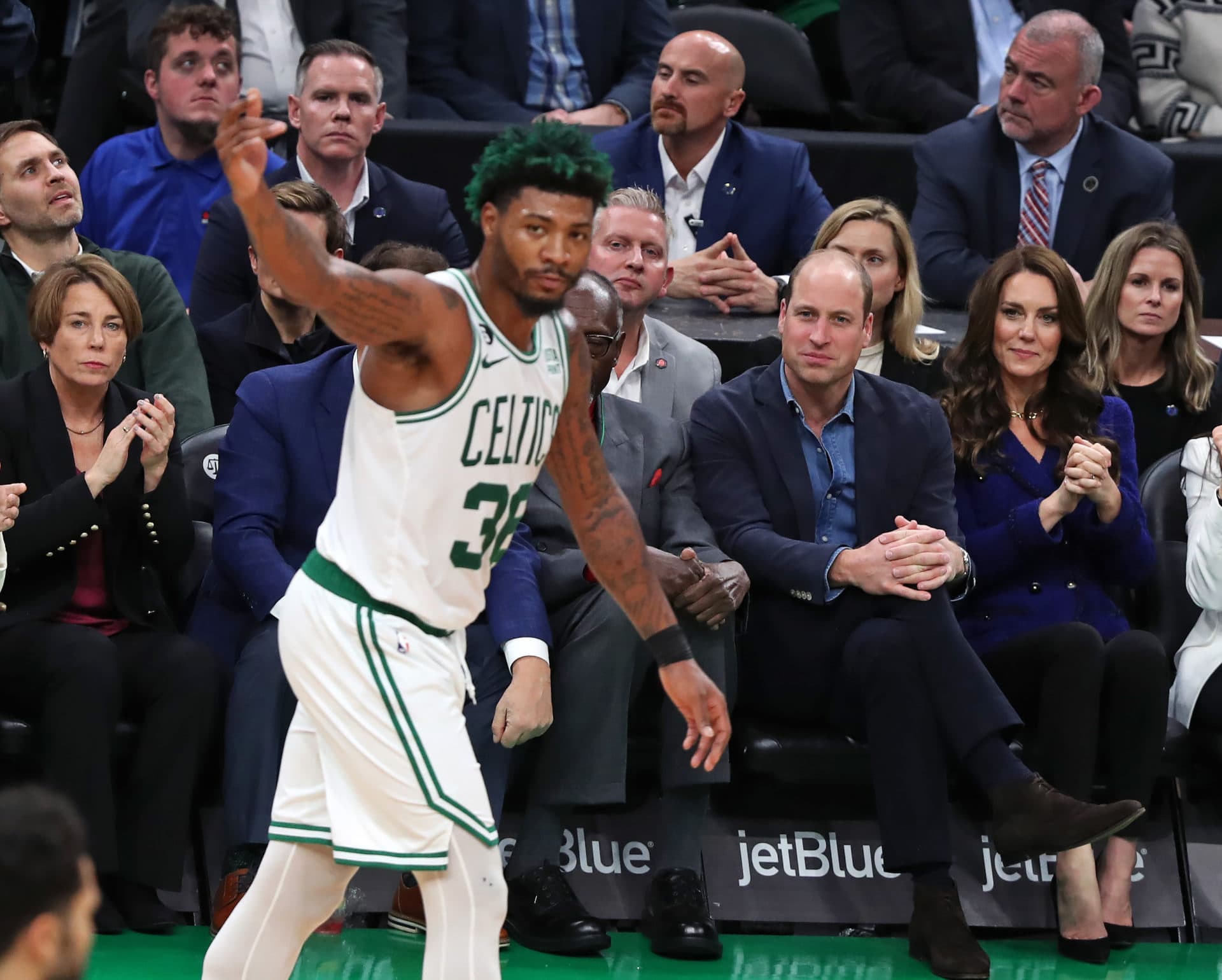 Governor-Elect Maura Healey, left, Prince William and Kate look on as Boston Celtics PG Marcus Smart gestures in front of them on the court. (Jim Davis/The Boston Globe via Getty Images)