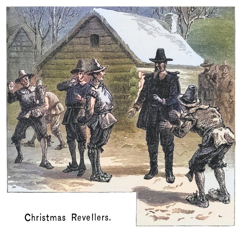An engraved illustration of William Bradford, governor of the Plymouth Colony, confiscating toys from Pilgrims on Christmas Day. Via Getty Images