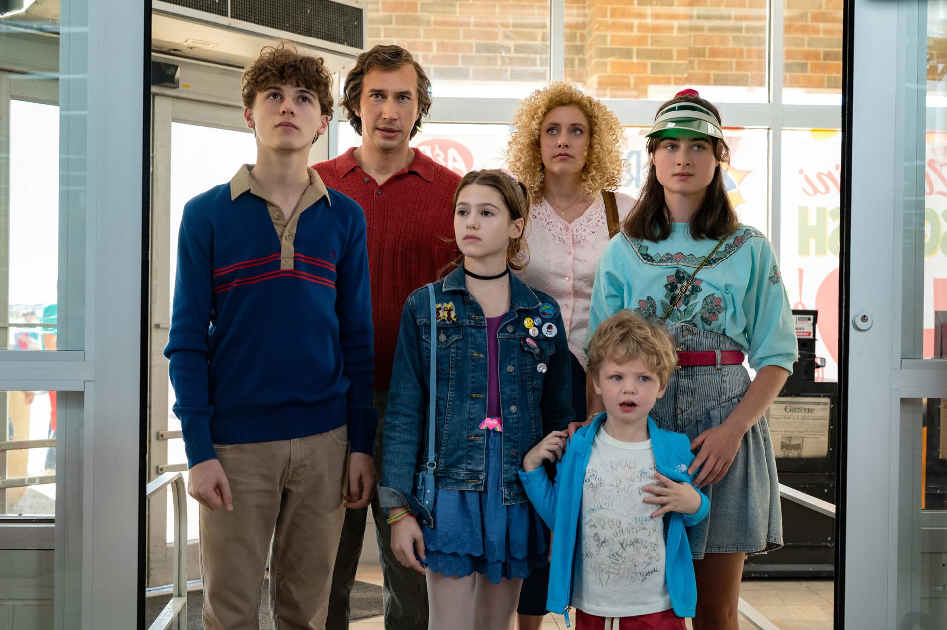 Still from &quot;White Noise.&quot; (Left to right) Sam Nivola as Heinrich, Adam Driver as Jack, May Nivola as Steffie, Greta Gerwig as Babette, Dean Moore/Henry Moore as Wilder and Raffey Cassidy as Denise. (Courtesy Netflix)