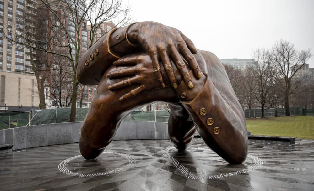 The Embrace, on Boston Common, recalls the hug between Dr. Martin Luther King Jr. and Coretta Scott King after he won the Nobel Peace Prize in 1964. (Robin Lubbock/WBUR)